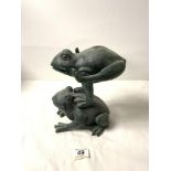 A RESIN FIGURE OF FROGS.