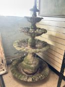 A WEATHERED STONE FOUR TIER GARDEN FOUNTAIN WITH SCALLOP EDGE PATTERN, 140 CMS APPROX.