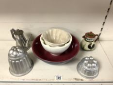 TWO WHITE CERAMIC JELLY MOULDS, TWO ALUMINIUM JELLY MOULDS, MOTTO WARE JUG AND MORE.