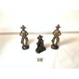 THREE IRON FIGURES OF COWBOYS, MODELLED BY GOODAN, 14 CMS TALLEST.