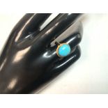 375 GOLD RING WITH A TURQUOISE COLOURED STONE SIZE N