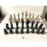 A RESIN MADE CLASSICAL FIGURES CHESS SET.