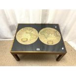 A GLASS TOP WORLD MAP COFFEE TABLE WITH BRASS BORDERS, 76 X 58 CM.