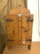 A SPANISH ELM 2-DOOR WALL CUPBOARD, WITH IRON HINGES AND HANDLES, 38 X 60 CM.