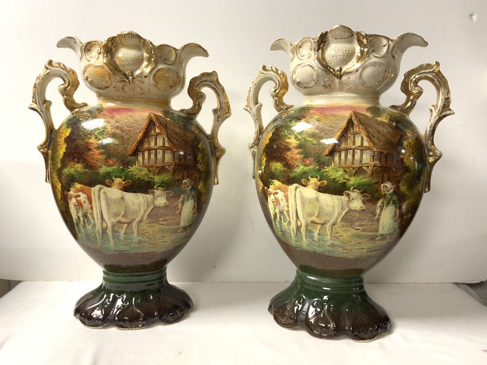 A PAIR OF LATE VICTORIAN CERAMIC VASE DECORATED WITH CATTLE AND MILKMAID, 35 CMS. A/F. - Image 2 of 5