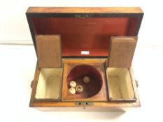 A VICTORIAN ROSEWOOD SARCOPHAGUS SHAPED TEA CADDY, WITH LIDDED COMPARTMENTS, 31 CMS.