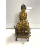 A GILDED WOODEN STATUE OF A BUDDHA, 30 CMS, ON A CARVED STAND.