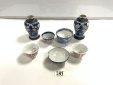 A PAIR OF SMALL ORIENTAL BLUE AND WHITE CRACKLE WARE VASES, 13 CMS, AND FIVE TEA BOWLS VARIOUS.