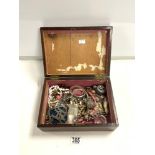 QUANTITY OF COSTUME JEWELLERY, RAC CAR BADGE, SCENT BOTTLE, IN A MAHOGANY BOX.
