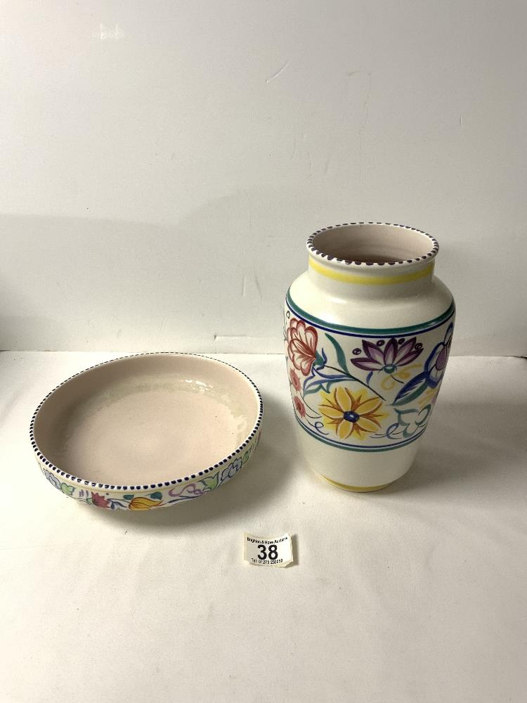 A POOLE POTTERY FLORAL DECORATED VASE, 23 CMS. AND A SIMILAR BOWL.