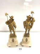 A PAIR OF GILDED SPELTER FIGURES OF CAVALIERS ON ALABASTER STANDS, 36 CMS.