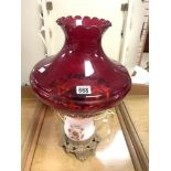 A VICTORIAN-STYLE OIL LAMP CONVERTED TO ELECTRIC, WITH A SATIN GLASS BODY AND RUBY GLASS SHADE, 54 X