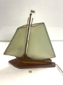 A 1950s MAHOGANY SAILING BOAT ELECTRIC TABLE LAMP, 42X48 CMS.