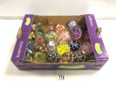 A COLLECTION OF 24 GLASS PAPERWEIGHTS OF VARIOUS DESIGNS.