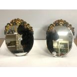 A PAIR OF OVAL BEVELLED BARBOLA EASEL MIRRORS, 30X43 CMS.