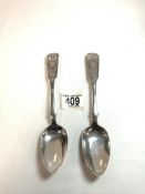 A PAIR OF NINETEENTH CENTURY CONTINENTAL 800 SILVER TABLE SPOONS, MAKER A.K, 21 CMS, 109 GMS.