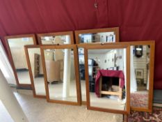 A SET OF EIGHT FRAMED CHERRY WOOD MIRRORS, 37X63.