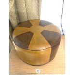 A MID-CENTURY TWO-COLOUR SHERBOURNE LEATHERETTE POUFFE.