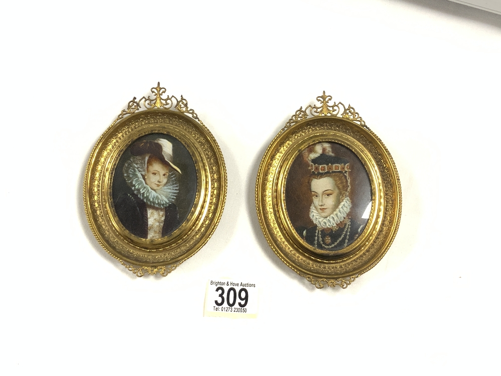 A PAIR OF OVAL PORTRAIT MINIATURES OF ELIZABETHAN LADIES, IN ORNATE BRASS FRAMES, 11X15 CM