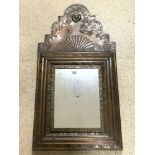 A MEXICAN COPPER WALL MIRROR WITH BEATEN DECORATION AND APPLIED BIRD MOTIF, A/F, 50 X 96 CM.