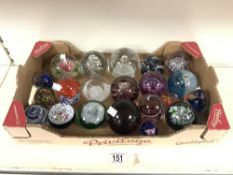 TWENTY-FOUR GLASS PAPERWEIGHTS OF VARIOUS DESIGNS.