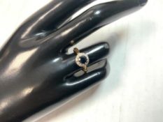 A 750 HALLMARKED GOLD DIAMOND AND SAPPHIRE DRESS RING, SIZE M AND HALF, 3.7 GMS.