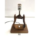 A LEATHER STIRRUP FPRM CONVERTED TABLE LAMP, 32 CMS; 1950'S ARIZONA