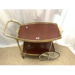 A RETRO 1970s GOLD DRINKS TROLLEY.