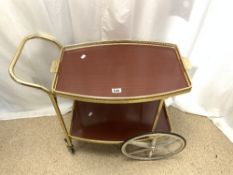 A RETRO 1970s GOLD DRINKS TROLLEY.