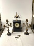 A VICTORIAN BLACK AND ROUGE SLATE CLOCK GARNITURE WITH GILT SPELTER MOUNTS AND DECORATION.