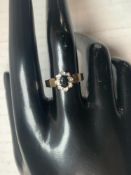 A 375 HALLMARKED GOLD DIAMOND AND SAPPHIRE SET LADIES DRESS RING, SIZE O, 2.7 GMS.
