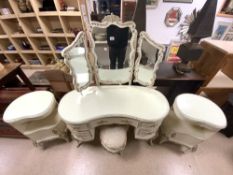 A FRENCH LOUIS STYLE KIDNEY SHAPED FOUR PIECE BEDROOM SET.