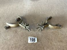 A PAIR OF BRASS SPURS WITH DECORATION; ARIZONA 1950'S