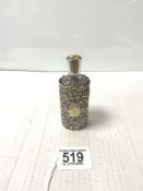 A LATE VICTORIAN HALLMARKED SILVER PIERCED AND EMBOSSED CASED SCENT BOTTLE, CHESTER 1901, MAKER