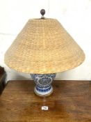 RALPH LAUREN BLUE AND WHITE CERAMIC LAMP WITH A WICKER SHADE 60CM