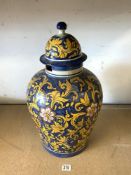 ANTIQUE TALAVERA POTTERY LARGE FIANCE JAR AND COVER, A/F ON WOODEN STAND; MADE IN MEXICO