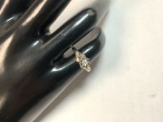 375 GOLD AND DIAMOND RING SET IN PLATINUM SIZE I