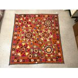 SUZANI FLORAL EMBROIDERED MULTICOLOURED WALL HANGING ON ORANGE BACKGROUND FROM UZBEKISTAN, `170 X
