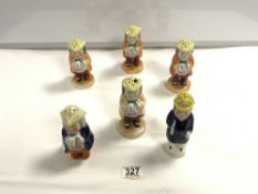 FIVE VICTORIAN STAFFORDSHIRE TOBY FIGURE SIFTERS, AND A POLICEMAN SIFTER, 14 CMS TALLEST. [ SOME