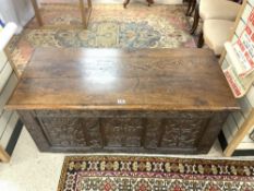19TH CENTURY OAK COFFER WITH A CARVED FRONT 129 X 56CM