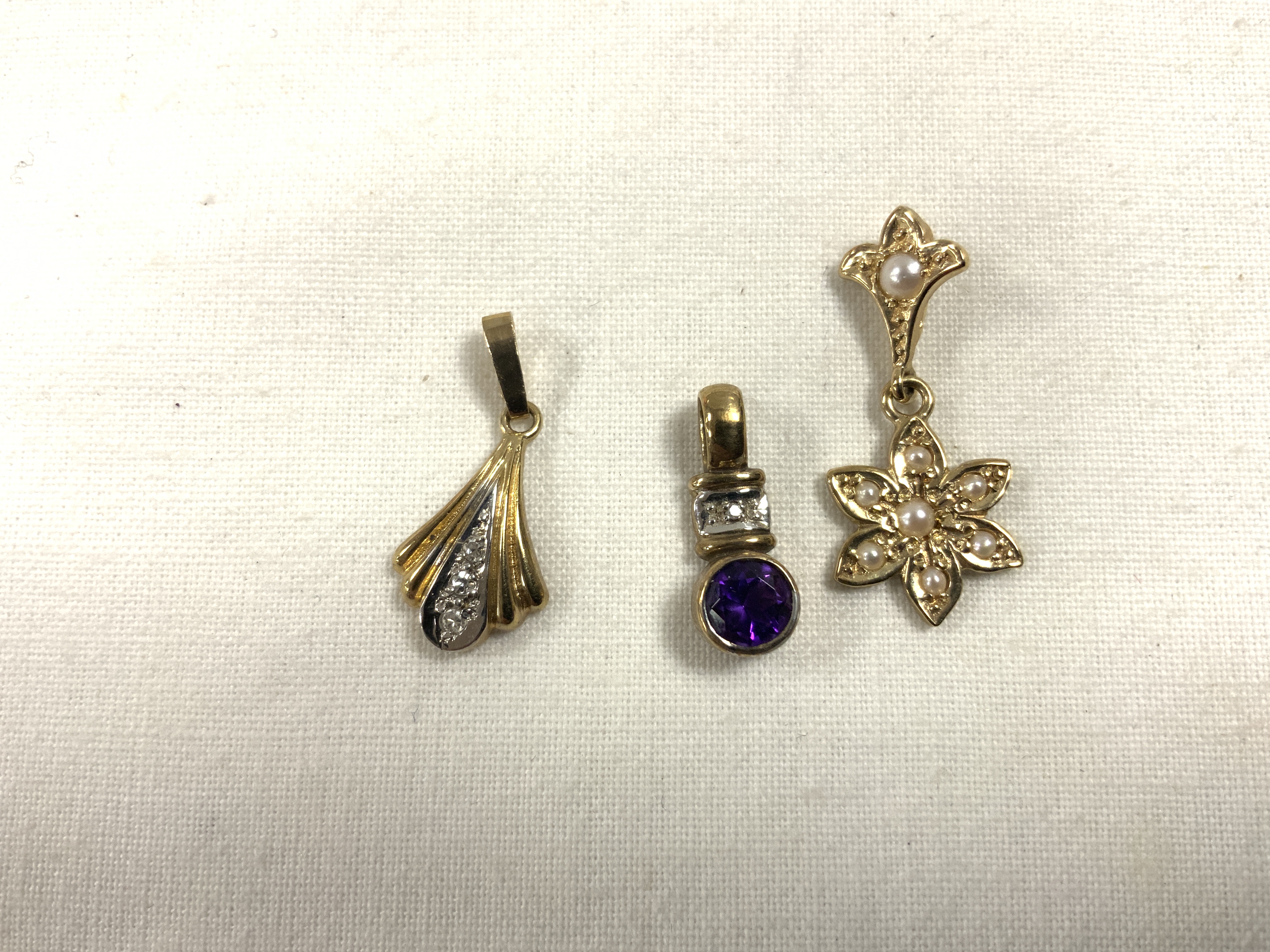 THREE 9CT GOLD P[ENDANTS ONE WITH DIAMONDS ONE WITH AMETHYST AND PEARLS - Image 2 of 3