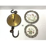 A SET OF SLATERS BRASS AND IRON TRADE HANGING SCALES, AND TWO CERAMIC METAL BORDERED PLATES.