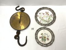 A SET OF SLATERS BRASS AND IRON TRADE HANGING SCALES, AND TWO CERAMIC METAL BORDERED PLATES.