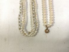TWO SETS OF PEARL NECKLACES BOTH WITH 9 CARAT GOLD CLASPS