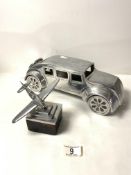 ALUMINIUM DESK TOP MODEL AEROPLANE, AND ALUMINIUM MODEL OF A 1950s CAR, 34 CMS.