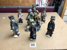 SEVEN GLAZED POTTERY FIGURES, BY NORMAN UNDERHILL, 17 CMS.