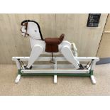 A PAINTED WOODEN ROCKING HORSE, 146X96 CMS.