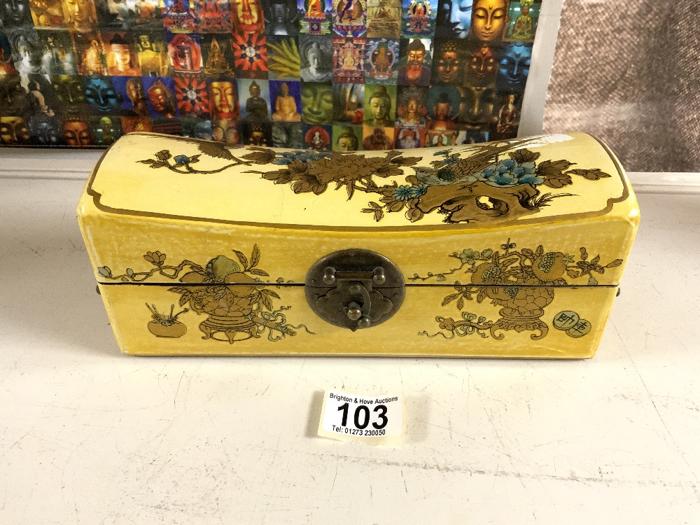 MODERN CHINESE YELLOW AND GOLD LACQUER TRINKET BOX, SHAPED AS A HEADREST, 26 CM.