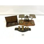 SET OF BRASS POSTAL SCALES, SET OF BRASS WEIGHTS ON CAST IRON STAND, AND SET BRASS BALANCE SCALES.