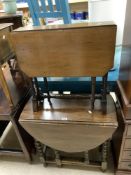 OAK GATE LEG TABLE ON BARLEY TWIST LEGS, 73X37X73 CMS, AND A VICTORIAN MAHOGANY SUTHERLAND TABLE.